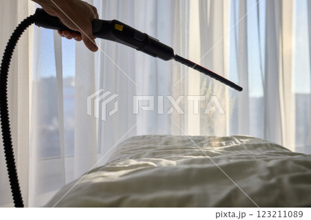 Steam Cleaning in Progress We Are Freshening Up Your Bedding for a Cozy Experience 123211089