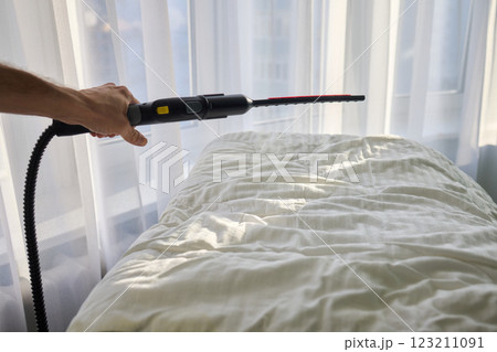Steam Cleaning in Progress We Are Freshening Up Your Bedding for a Cozy Experience 123211091