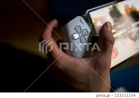 Enjoy an exciting gaming session with a handheld console full of thrills and adventures Enjoy an exciting gaming session with a handheld console full of thrills and adventures 123211154