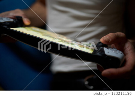 Enjoy an exciting gaming session with a handheld console full of thrills and adventures Enjoy an exciting gaming session with a handheld console full of thrills and adventures 123211156