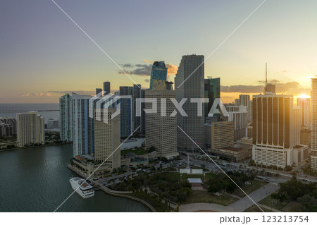 Evening urban landscape of downtown district of Miami Brickell in Florida, USA. Skyline with dark high skyscraper buildings in modern american megapolis Evening urban landscape of downtown district of Miami Brickell in Florida, USA. Skyline with dark high skyscraper buildings in modern american megapolis 123213754