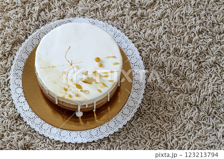 Delicious homemade chocolate marble birthday cake decorated with colorful stripes 123213794