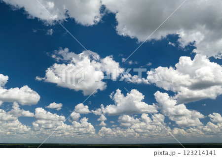 Blue sky with white summer rain clouds. Colorful summer landscape Blue sky with white summer rain clouds. Colorful summer landscape 123214141