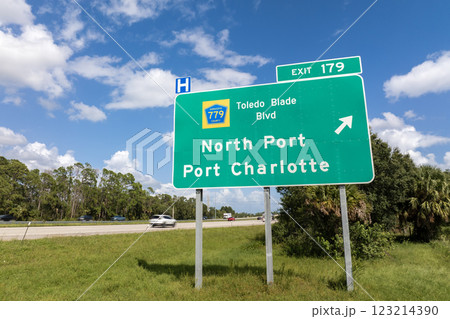 American freeway exit sign in Florida. I-75 highway junction with direction to North Port and Port Charlotte 123214390