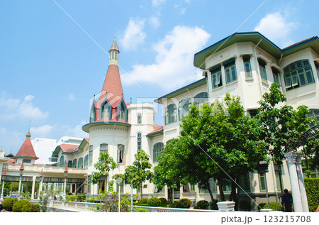 Historic building with a tower and lush greenery at Phayathai Palace Historic building with a tower and lush greenery at Phayathai Palace 123215708