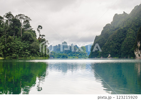 Khao Sok national park at Surat Thani, Thailand, Serene lake surrounded by lush mountains Khao Sok national park at Surat Thani, Thailand, Serene lake surrounded by lush mountains 123215920