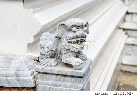 Stone guardian statue with intricate details in Wat Phra Kaew Bangkok Thailand 123216027