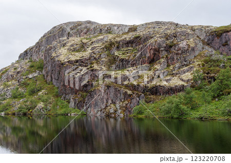 Rocky shore of a small lake in tundra Rocky shore of a small lake in tundra 123220708