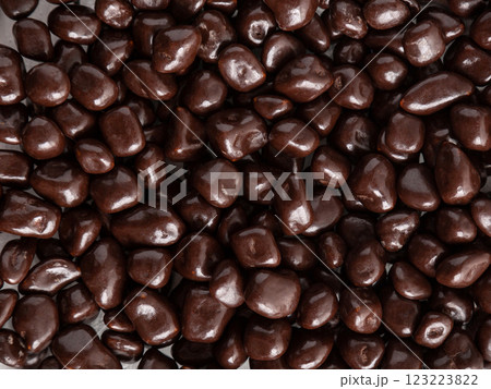 Lots of brown chocolates. Background, texture, lots of sweets. Lots of brown chocolates. Background, texture, lots of sweets. 123223822