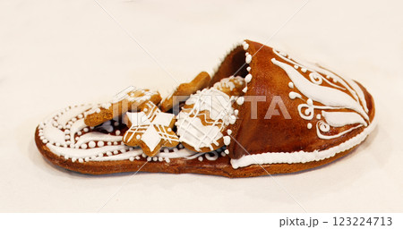 Brown edible gingerbread female shoes on white marble Brown edible gingerbread female shoes on white marble 123224713