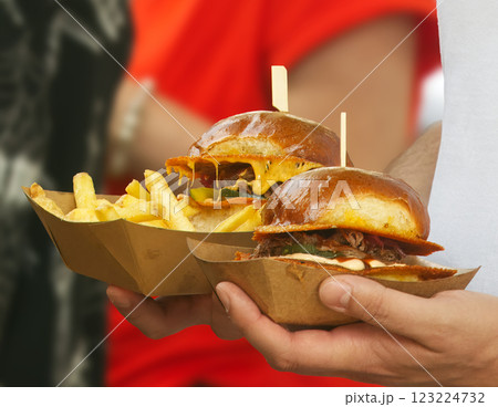 Two Delicious Burgers Served With French Fries in Takeaway Containers 123224732