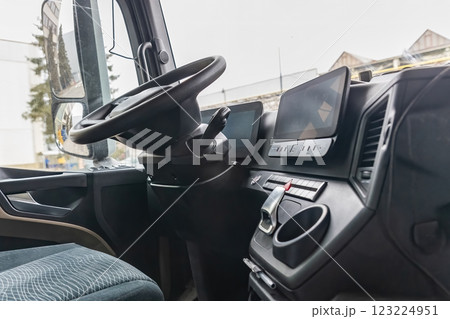Lower angle view of empty cabin of a modern truck Lower angle view of empty cabin of a modern truck 123224951
