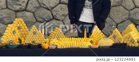 Stand with a wide range of beeswax candles Stand with a wide range of beeswax candles 123224993