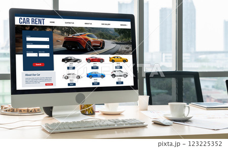 car rental website on computer screen for tourist to rent a car for snugly 123225352