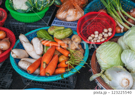 assortment of vegetables at street grocery and vegetable market in Asia in Vietnam 123225540