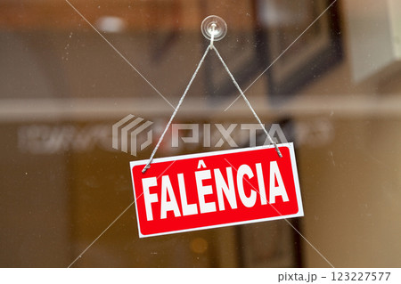 Bankruptcy sign written in Portuguese 123227577