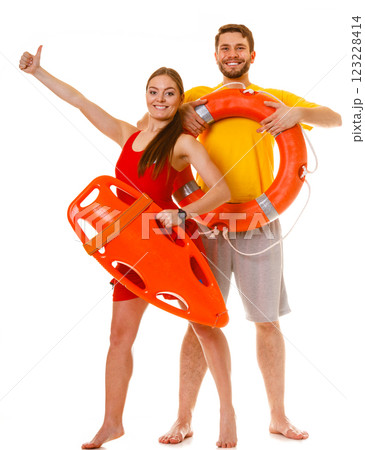 Lifeguards with rescue and ring buoy lifebuoy. 123228414
