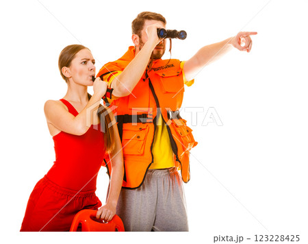 Lifeguards in life vest jacket whistling. 123228425
