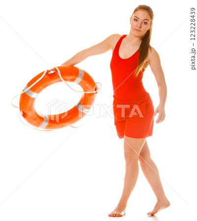 Lifeguard on duty with ring buoy lifebuoy. 123228439