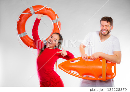 lifeguard couple with rescue equipment lifeguard couple with rescue equipment 123228879
