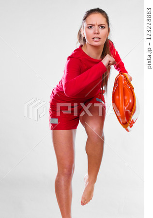 lifeguard running with equipment 123228883