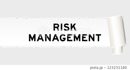 Ripped gray paper background that have word risk management under torn part 123231180