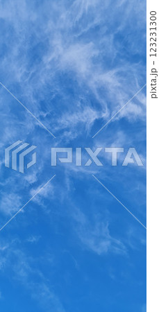 Vertical blue sky photography with white clouds Vertical blue sky photography with white clouds 123231300