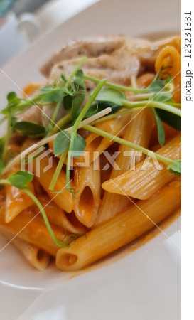 Pasta in tomato sauce with green herbs 123231331