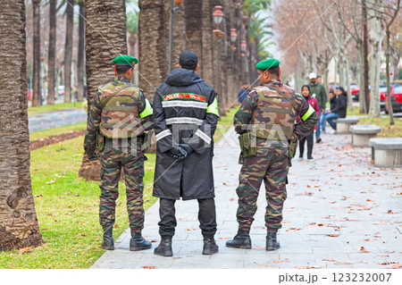 Moroccan policeman alongside two soldiers Moroccan policeman alongside two soldiers 123232007