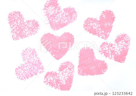 Pink heart stamps arranged beautifully on a plain white background 123233642