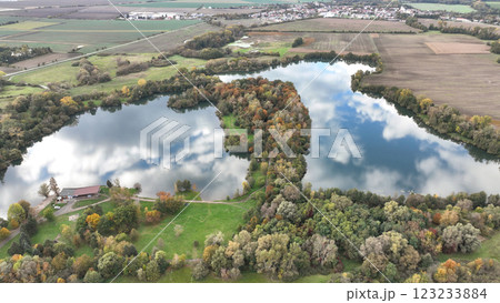 Gravel sand pit Podebrady Olomouc drone aerial recreational pond tourists restaurant nature autumn fall forest nice colliery output of building surface gray pile transfer and mine quarry lake Europe Gravel sand pit Podebrady Olomouc drone aerial recreational pond tourists restaurant nature autumn fall forest nice colliery output of building surface gray pile transfer and mine quarry lake Europe 123233884