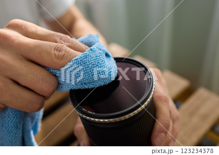 Successfully Cleaning Your Camera Lens with a High-quality Microfiber Cloth to Ensure Clarity 123234378