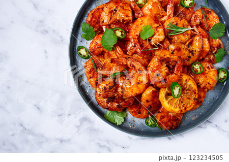 grilled shrimp, unpeeled, headless, with spices, on a marble table, homemade, no people, grilled shrimp, unpeeled, headless, with spices, on a marble table, homemade, no people, 123234505