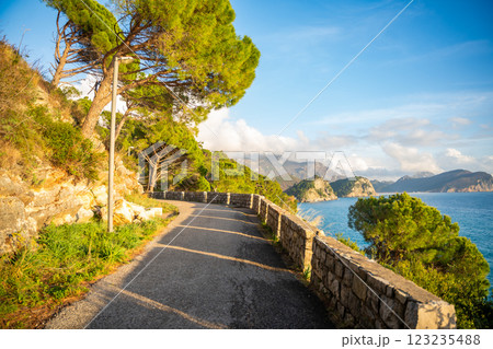 Pedestrian path to tunnel through a rock or mountain near Petrovac town in winter time, Montenegro.  123235488