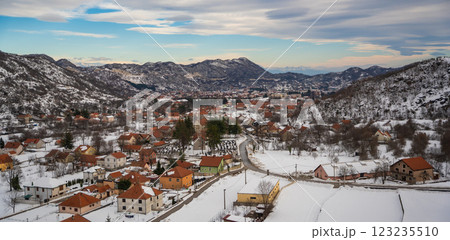 Aerial view of Lovcen mountains and Cetinje city in Montenegro in winter time Aerial view of Lovcen mountains and Cetinje city in Montenegro in winter time 123235510