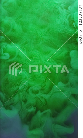 Colorful fog. Smoke splash. Defocused green fluid flow liquid cloud vapor paint ink texture water mist fume on art light background. 123235737