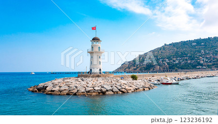 Panoramic view of old lighthouse in Alanya port. Landscape view of Mediterranean coast, Alanya, Turkey. High quality photo Panoramic view of old lighthouse in Alanya port. Landscape view of Mediterranean coast, Alanya, Turkey. High quality photo 123236192