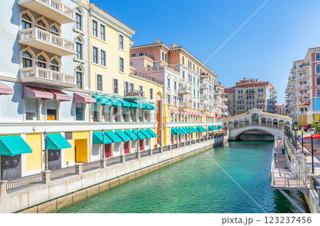 Qanat Quartier Venetian copy luxury residential district with authentic colorful apartment buildings and water channel with bridge, Pearl Island, Doha, Qatar 123237456
