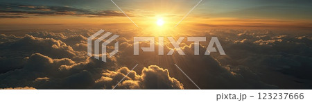 The bright sun is shining beautifully through the fluffy clouds in the vast sky 123237666