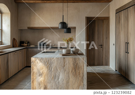 Modern rustic kitchen with stone island, wood cabinets, and minimalist decor in natural light 123239082