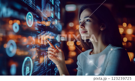 ホログラフィックディスプレイを操作する若い女性 123239725
