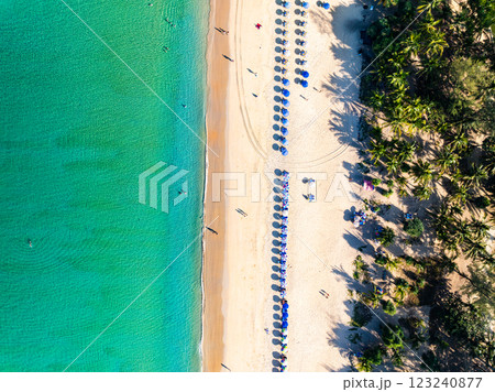 Summer seascape beautiful waves,Tropical sea water in sunny day, Top view from drone camera,Amazing ocean colorful nature background, Beautiful bright sea waves splashing on beach sand Summer seascape beautiful waves,Tropical sea water in sunny day, Top view from drone camera,Amazing ocean colorful nature background, Beautiful bright sea waves splashing on beach sand 123240877