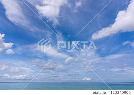 Beautiful blue sky white clouds over sea ocean background Beautiful blue sky white clouds over sea ocean background 123240900