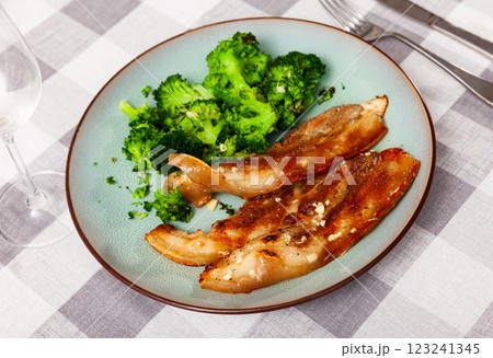 Roasted delicious pork belly with garnished of fresh broccoli Roasted delicious pork belly with garnished of fresh broccoli 123241345