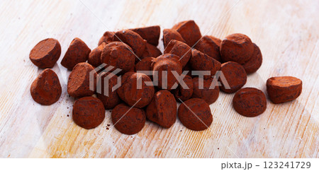 Chocolate candies truffles on light table Chocolate candies truffles on light table 123241729