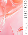 Abstract fluid texture in pink and orange with translucent curves pattern 123243069