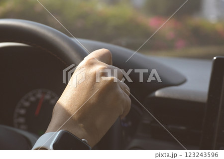 female driver hand hold steering wheel drive vehicle car rode trip travel female driver hand hold steering wheel drive vehicle car rode trip travel 123243596