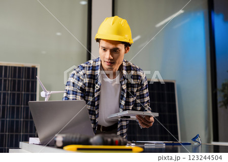 Engineer, blueprint and site building job for architect, builder and engineer sketching a construction project, green energy and solar panel concept. 123244504