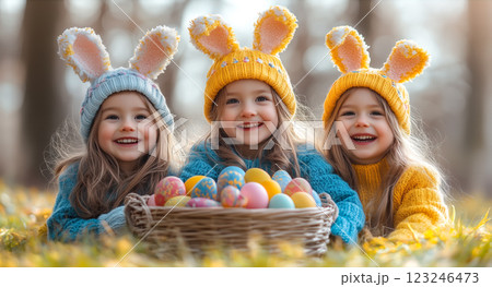 Three little girls wear bunny ears and hold a basket filled with colorful painted Easter eggs. The concept of Easter celebration, childhood joy, and festive traditions. Generative AI. Three little girls wear bunny ears and hold a basket filled with colorful painted Easter eggs. The concept of Easter celebration, childhood joy, and festive traditions. Generative AI. 123246473