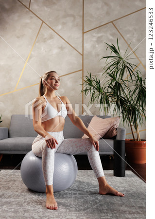 young girl doing home fitness, home workouts young girl doing home fitness, home workouts 123246533